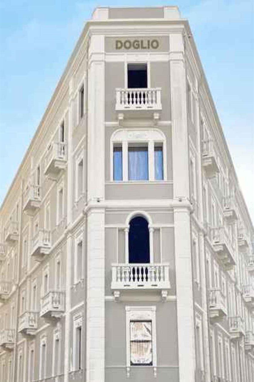 Palazzo Doglio Hotel Cagliari Eksteriør billede The facade of the building