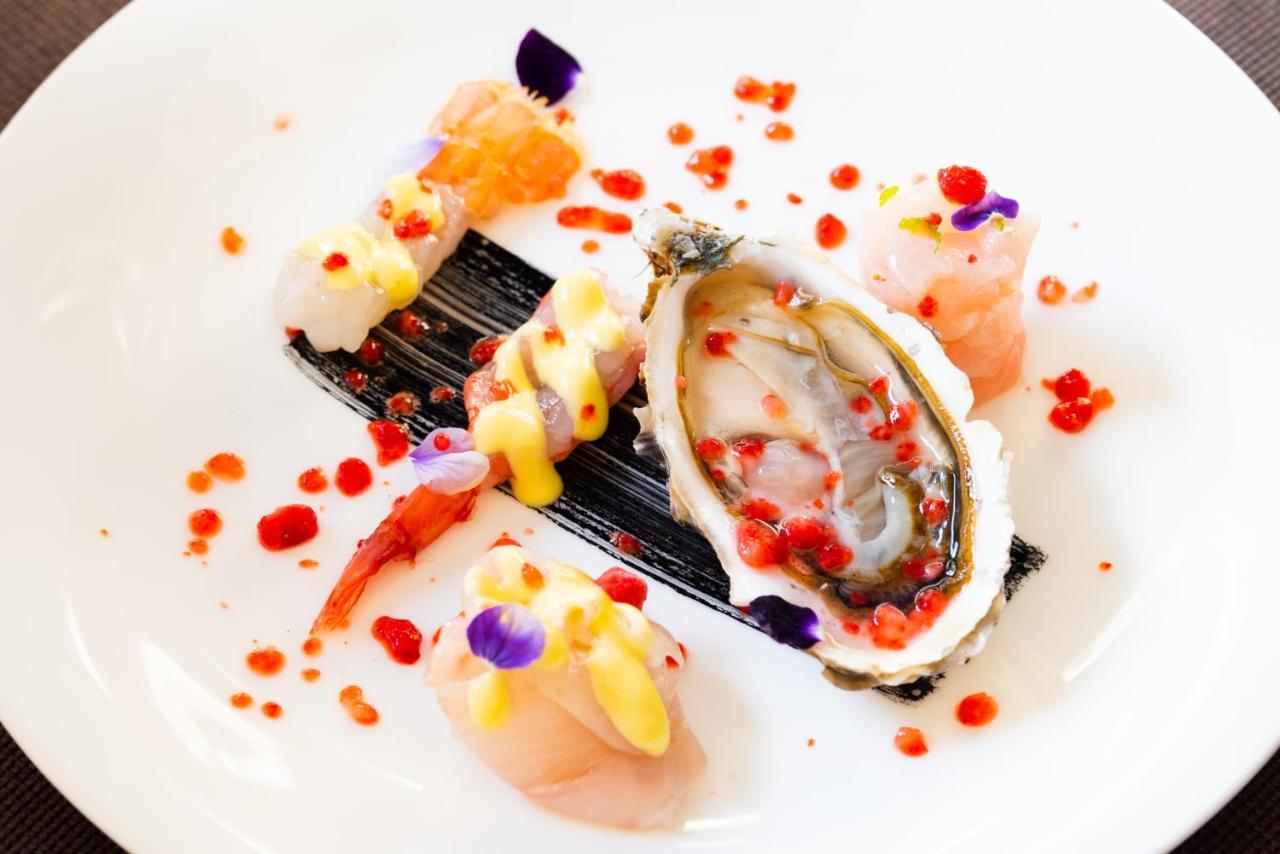 Palazzo Doglio Hotel Cagliari Eksteriør billede Oyster with caviar